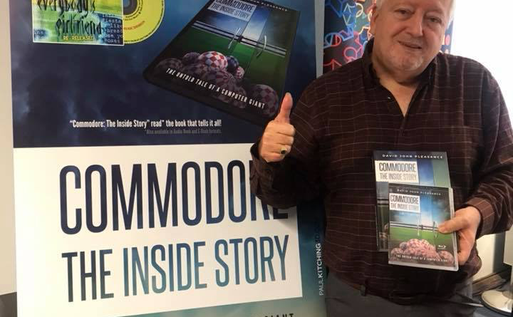 David Pleasance holding his new book